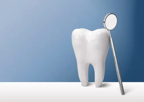 A realistic 3D model of a white human tooth standing next to a professional dental mirror on a blue background at Legacy Oral Surgery in New York and New Jersey.