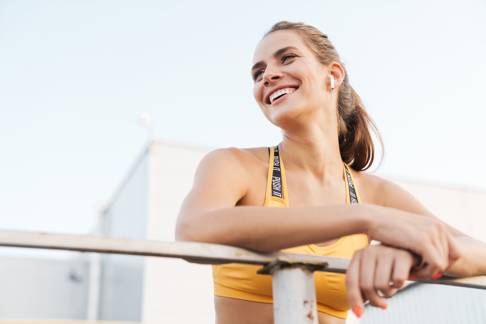 Person walking outdoors during tooth extraction recovery